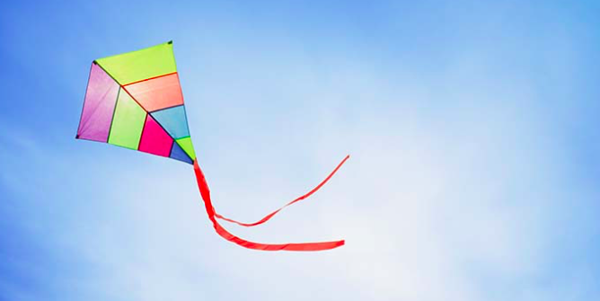 Kite in blue sky